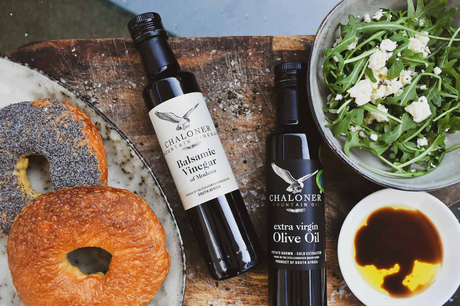 a table with Balsamic Vinegar and olive oil