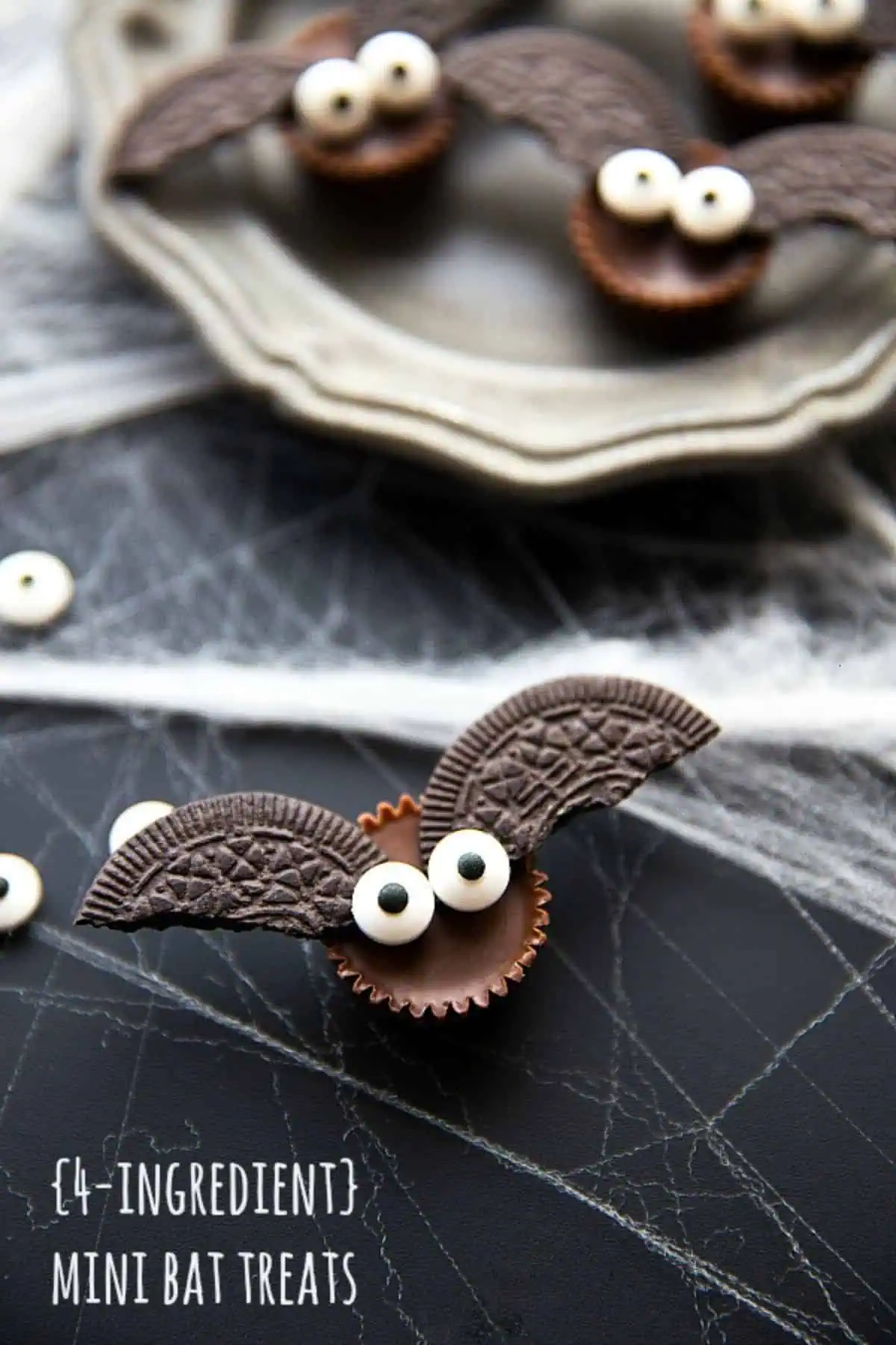 dark chocolate peanut butter cups turned into bats for an adorable fall or halloween themed treat or snack