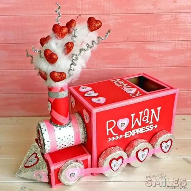 red train DIY valentine box with puff of "steam" from polyfill/cottonballs