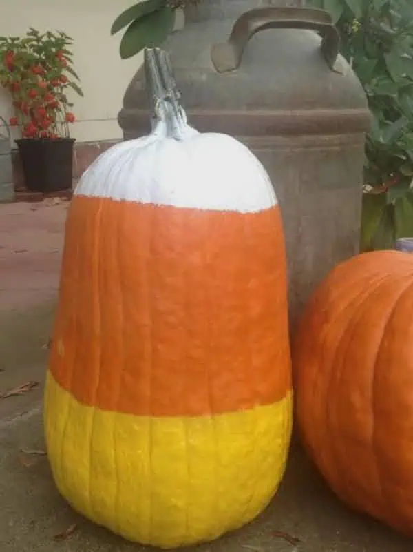 Creative Homemaking: pumpkin painted in white, orange and yellow to look like a candy corn.