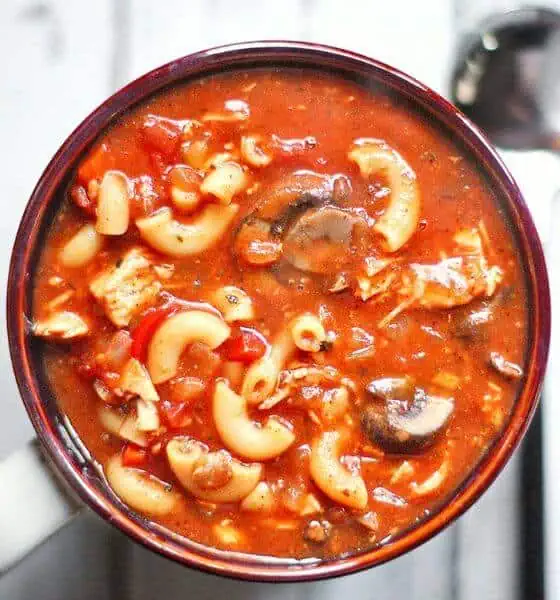 crockpot chicken and chili soup in brown bowl