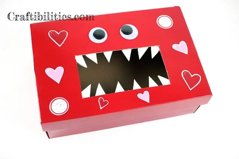 red monster valentine box with teeth and googly eyes