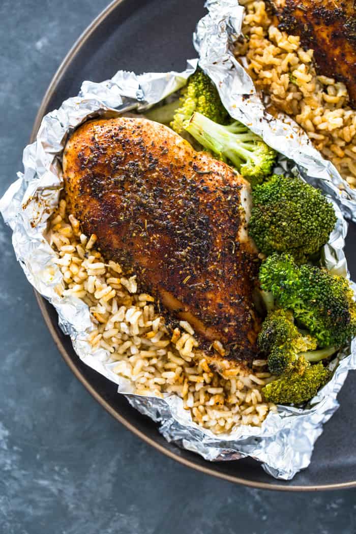 A variety of colorful and delicious foil packets for the oven featuring chicken foil packets, vegetable foil packets, and seafood foil packets in aluminum foil.