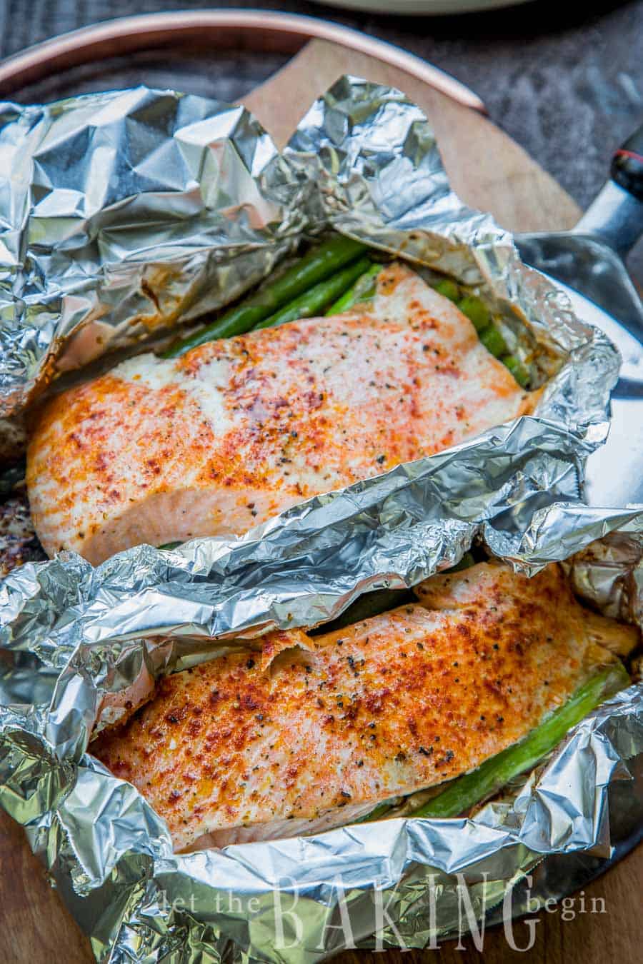 A variety of colorful and delicious foil packets for the oven featuring chicken foil packets, vegetable foil packets, and seafood foil packets in aluminum foil.