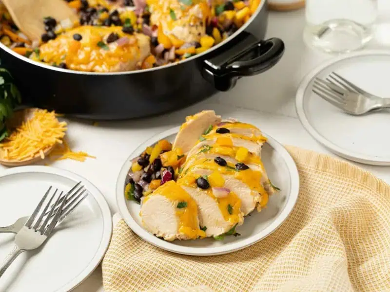 image 14516 - All it takes is one skillet to deliver a wealth of Southwestern flavors right to your taste buds. The New Mexico Skillet is a one-pan meal filled with juicy chicken, melty cheese, and a hearty, tender, and savory vegetable medley. It tastes even better than it sounds, and it already sounds amazing! The New Mexico Skillet is well-suited to hectic weeknights since it only takes 30 minutes to make, so you can escape to the sunny Southwest whenever you want!