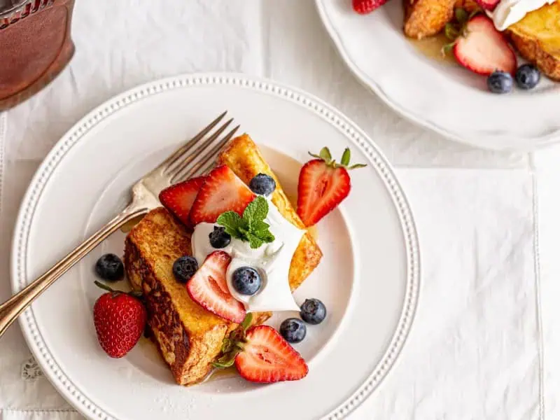 image 15392 - Bring a little piece of heaven to the breakfast table! It's easy with this Angel Food French Toast! The ethereally fluffy slices of cake, soaked in custard, pan-fried in butter until golden-brown, and garnished with your favorite sweet breakfast toppings? That's an angelically delicious breakfast in our books. Watch out because Angel Food French Toast might just sprout wings!