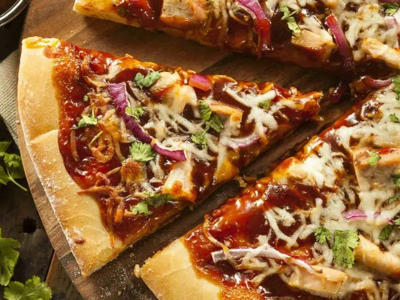 image 16953 - Don’t wait for delivery when you have a hankering for pizza! 20-Minute BBQ Chicken Pizza is faster than any take-out and even more delicious! The chicken is juicy and coated in the smoky-sweet barbeque sauce, which creates a nice contrast with the tangy red onions! This pizza has all of the delicious cheese stretchiness and meltiness that makes pizza so alluring without the wait! 20-Minute BBQ Chicken Pizza will become a weeknight favorite or a weekend snack the second you try it!