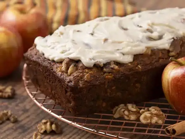 image 17152 - Brunch and fall! What a perfect pair! Whip out your favorite scarf and a delicious spread, then relax and enjoy it with the ones you love most. Might we suggest adding this Amazing Apple Walnut Bread to your marvelous menu? It's moist, crumbly, and brings just enough of those appley and walnut-y flavors to make it feel fall enough. Make sure you don't skip out on the rich and creamy brown butter glaze on top, too. It's so dreamy! Nothing compares to enjoying a delightful mid-morning meal as the leaves flutter to the ground, and this Amazing Apple Walnut Bread can make it even better!