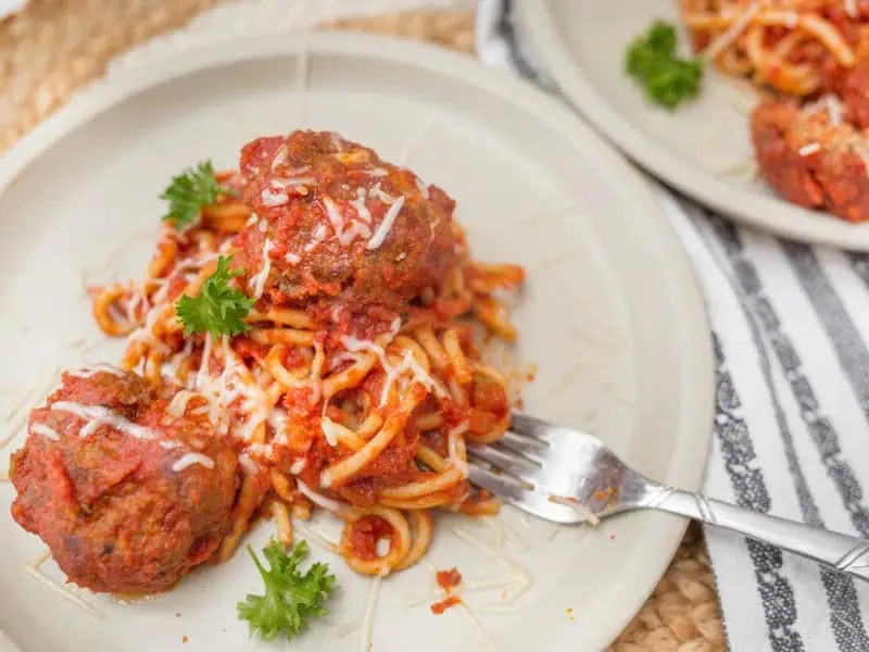 image 2150 - Does any dish require less of an explanation or introduction than Classic Spaghetti & Meatballs? Homemade, beefy, savory, juicy meatballs in a rich, bright, sweet marinara with just a note of heat from the red pepper flakes, all on top of a bed of tender spaghetti. So many people claim Classic Spaghetti & Meatballs as their favorite dish, and for good reason! Just describing it in words doesn't do it justice: this is a dish you just have to make for yourself and enjoy to the fullest!