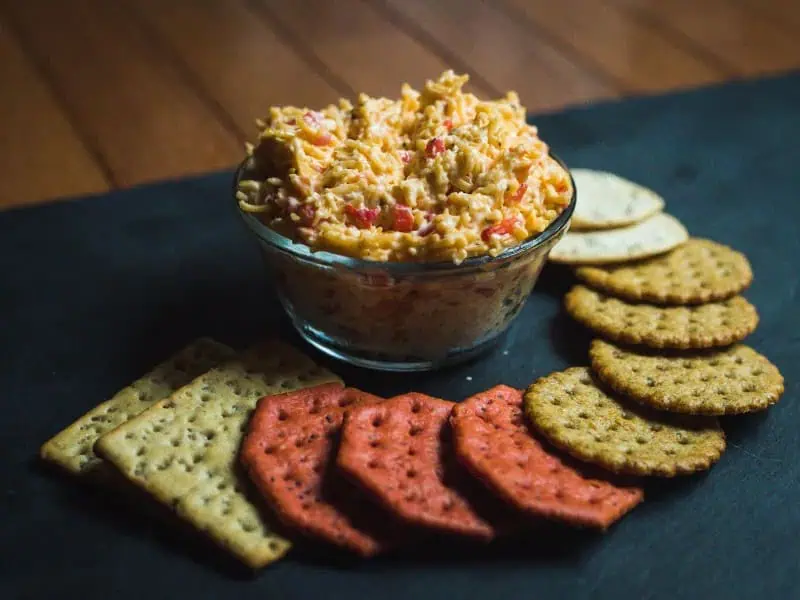 image 21849 - The caviar of the South doesn't have to be the bane of your waistline! Light Pimento Cheese makes some simple, low-fat substitutions so you can enjoy the sharp, creamy, and spicy mixture of cheese and pimento peppers without a shred of guilt! Spread it on crackers, toast, or vegetables, because Light Pimento Cheese is versatile and makes everything it touches delicious. It's kind of like pixie dust that way, especially in how truly light, speedy, and low in calories it is! Seriously, you'll have trouble finding a low-fat snack that's as convenient as this.