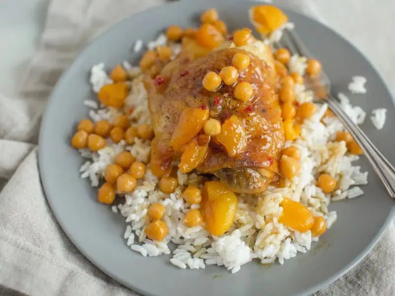 image 5482 - Let's spice things up in the sweetest of ways! This tender and juicy Moroccan Apricot Chicken brings you flavors from far, far away. The sweet and spicy sauce it's simmered in will have you dancing all night long. And it's quite delicious atop a bed of fluffy rice or next to some fresh steamed veggies. What are you waiting for?! Moroccan Apricot Chicken will take your tastebuds to places they never knew existed!