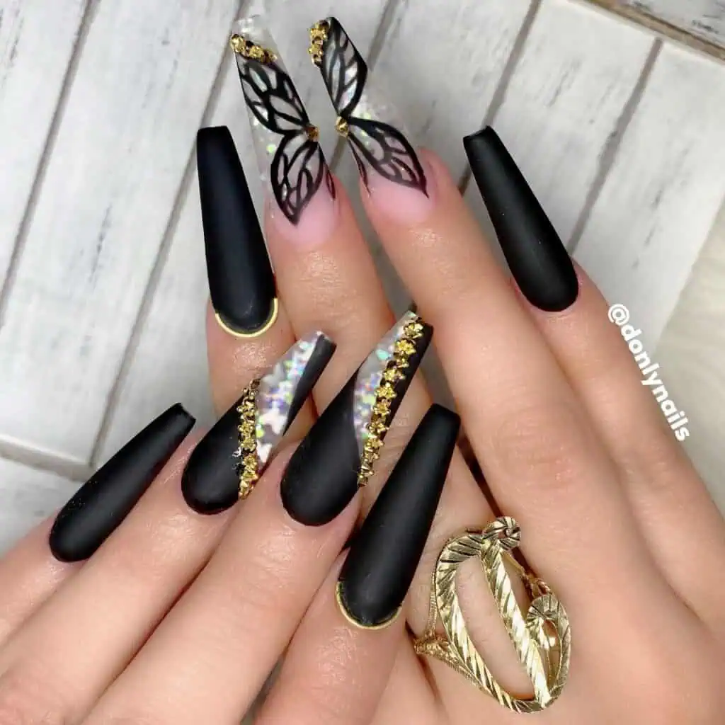 An enchanting showcase of butterfly-themed nails in shades of pink, blue, and purple, elegantly styled on acrylic and coffin shapes.