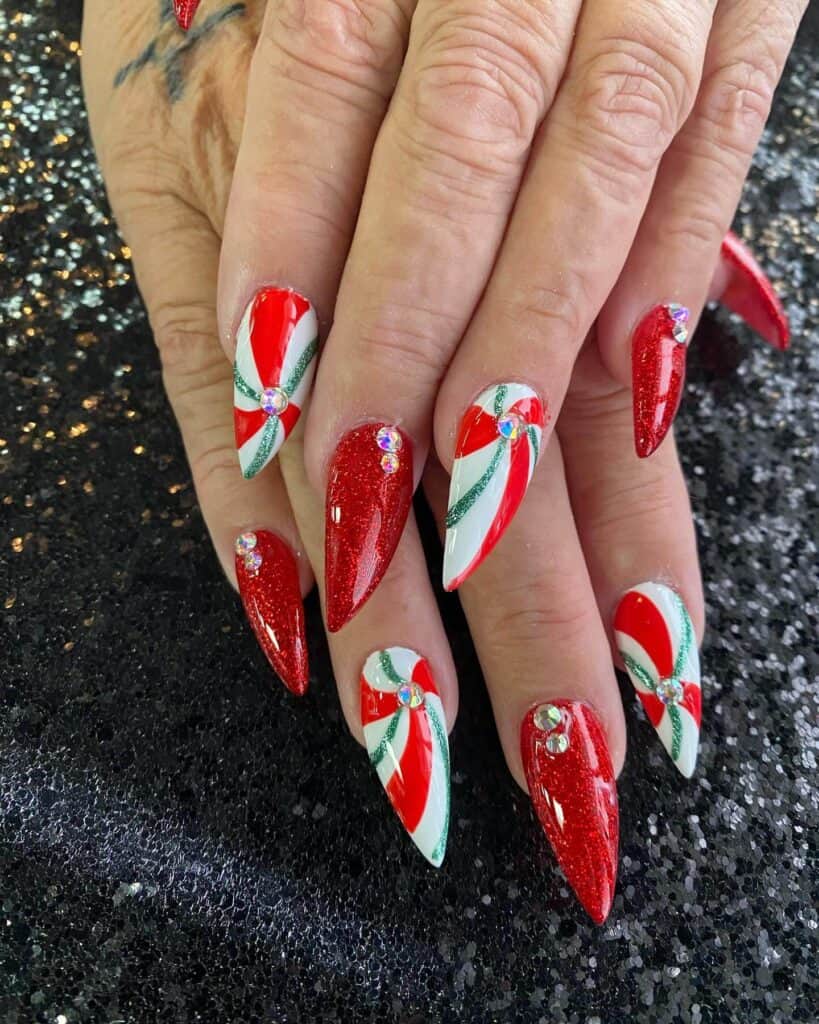 Detailed shot of festive nails showcasing candy cane stripes, lollipop swirls, and candy corn patterns in bright, vibrant hues.