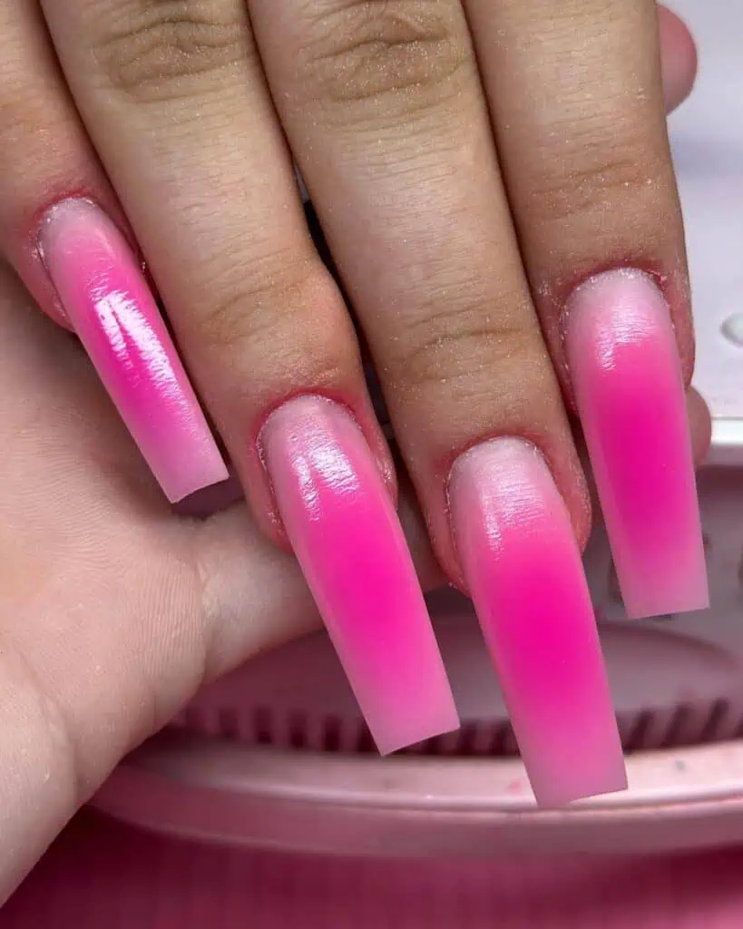 Assortment of summer pink nail colors and styles, featuring vibrant hot pinks, bold neons, and soft pastel pinks, ideal for chic summer nails.