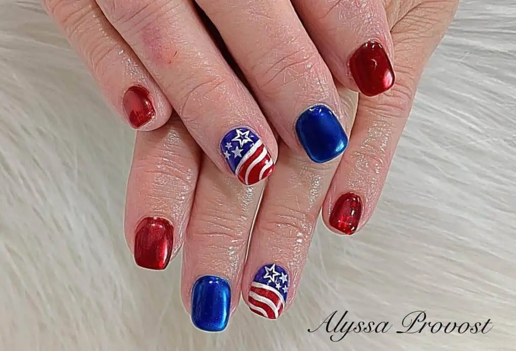Celebrate the 4th of July with stunning nails showcasing a mix of stars, stripes, and shimmering glitter in the classic colors of red, white, and blue.