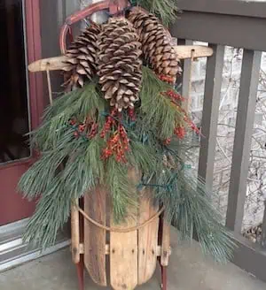 Wooden Sled with Evergreen and Pinecones