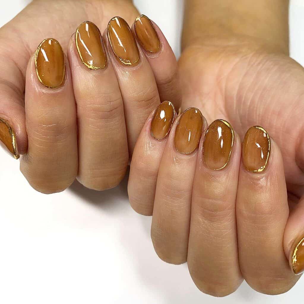 Discover the charm of amber nails with a variety of creative designs, from gel to acrylic styles. Find inspiration for your next manicure.