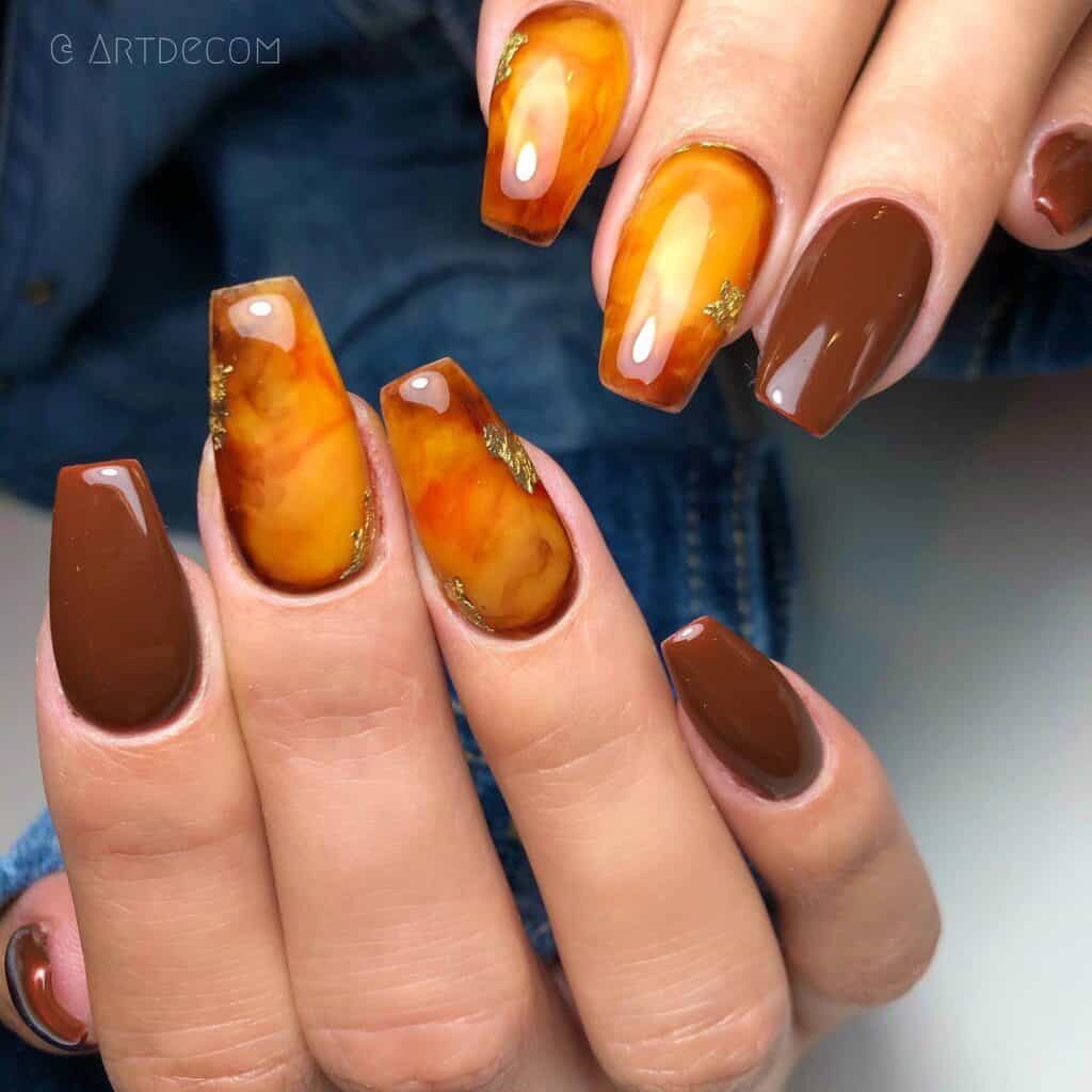 Discover the charm of amber nails with a variety of creative designs, from gel to acrylic styles. Find inspiration for your next manicure.