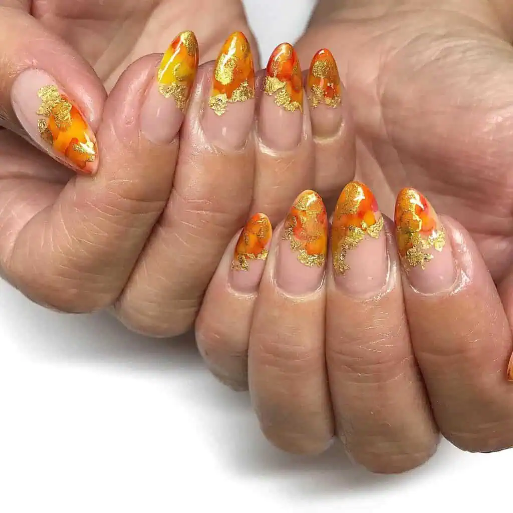 Discover the charm of amber nails with a variety of creative designs, from gel to acrylic styles. Find inspiration for your next manicure.