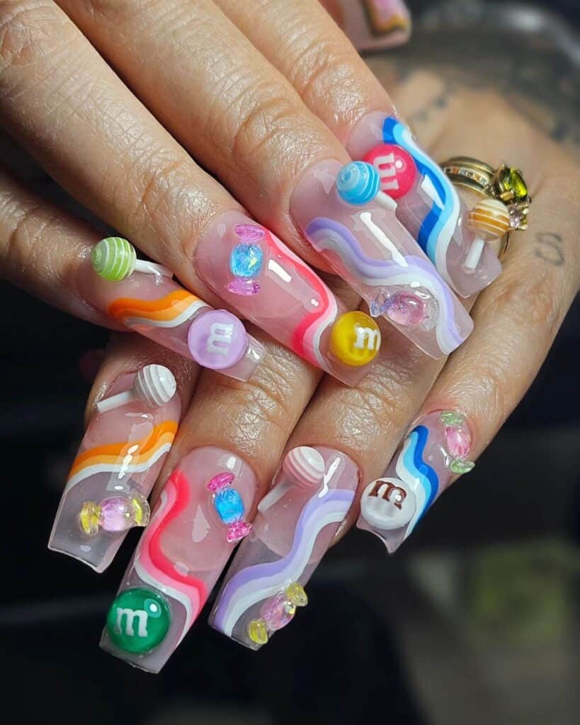 Detailed shot of festive nails showcasing candy cane stripes, lollipop swirls, and candy corn patterns in bright, vibrant hues.