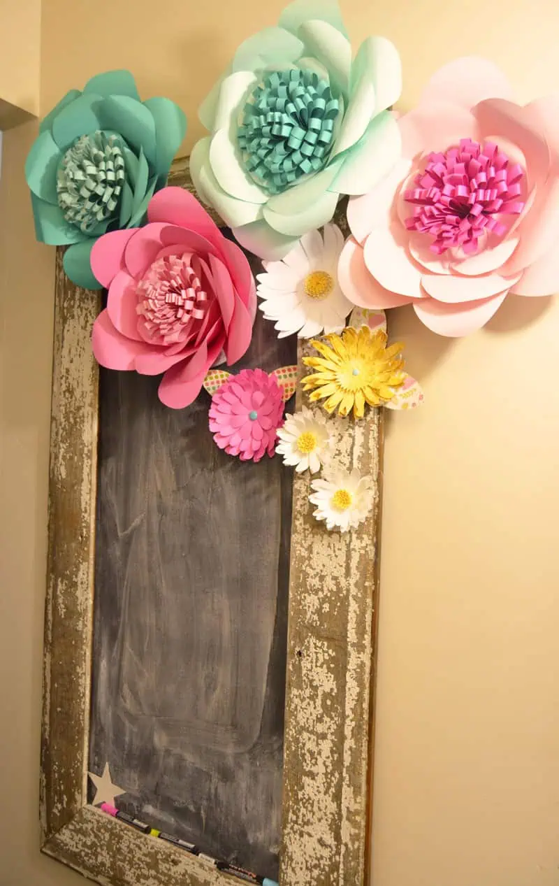 Chalkboard adorned with pretty paper flowers
