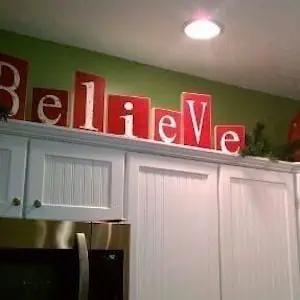 Believe Sign Above Kitchen Cabinet Christmas Kitchen Decor