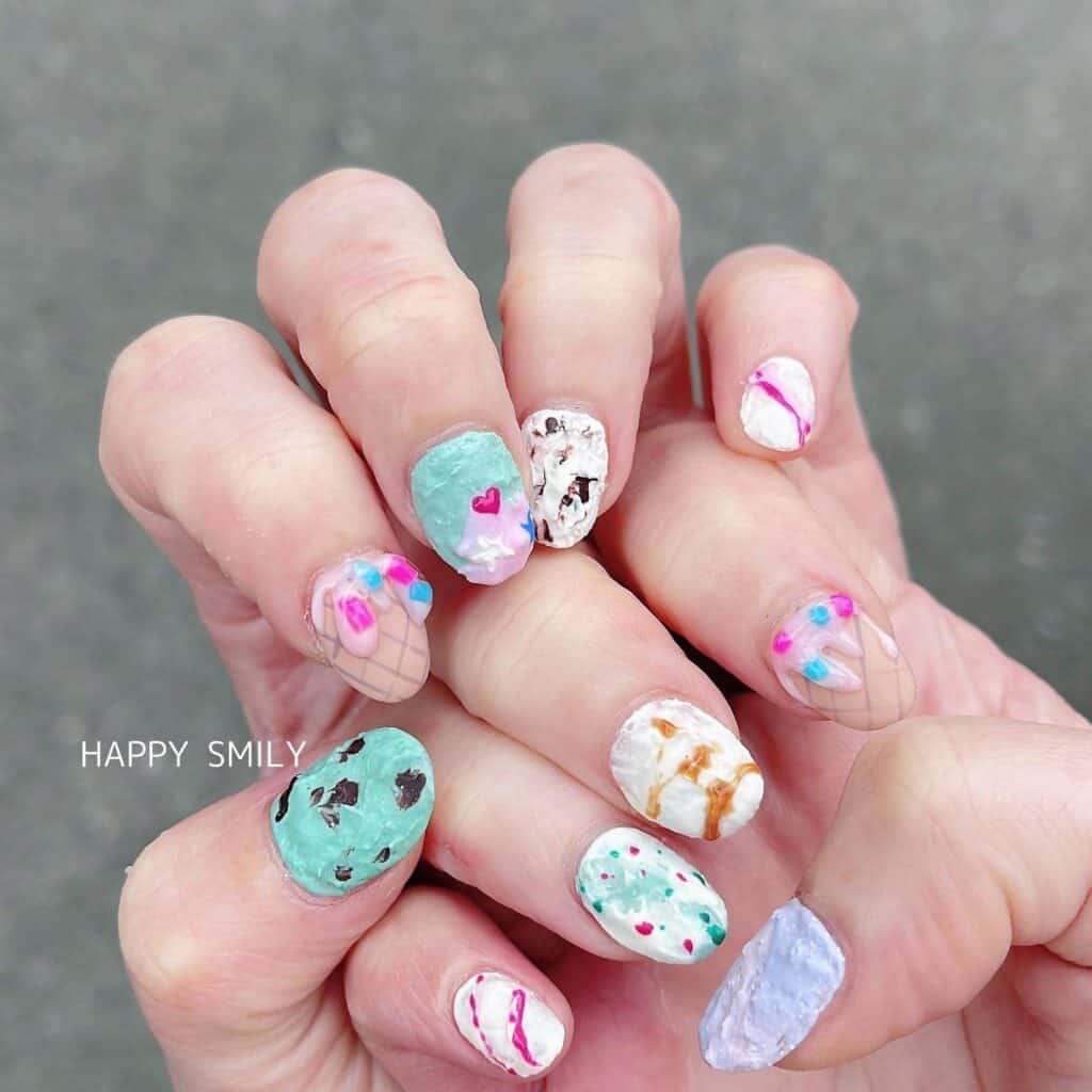 A collection of vibrant, sweet summer nails inspired by ice cream, gelato, and the beach.