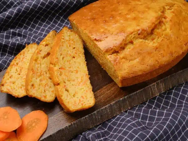 image 224 - A sunset orange hue, lightly sweet, and delightfully tender, this Carrot Spoon Bread Bake makes a wonderful first impression. And second impression. And every impression after that, come to think of it. It's a beautiful and simple bread that's just waiting for a pat of honey butter and begging to be snacked on while it's still warm. Carrot Spoon Bread Bake is wholesome baking at its finest!