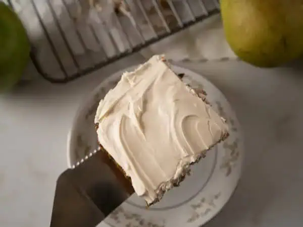 image 231 - Just you wait, hungry reader, just you wait! Because My Fair Lady Cake is about to prove that it has the perfect pronunciation of flavors! Tart apples and sweet pears are baked into the cake to make it extra flavorful, tender, and moist! On top it is adorned with a luscious, tangy, and creamy frosting... it's just lover-ly! My Fair Lady Cake will totally revamp your dessert cravings!