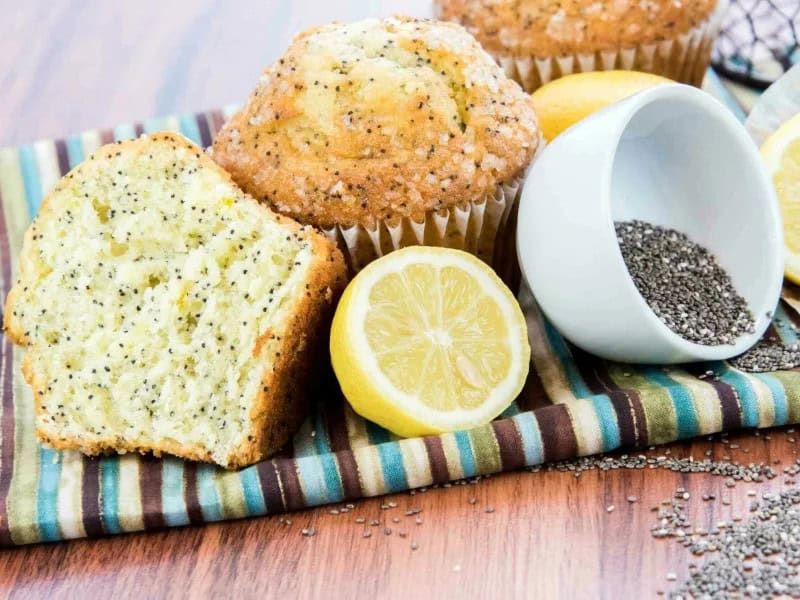 image 247 121 - Lemon and poppy seed pair so well together, with the citrus brightness of the lemon melding beautifully with the mild nuttiness of the poppy. Lemon Poppy Seed Muffins are bakery-style proof of how these flavors can make mornings magnificent! Balancing sweet and tart, Lemon Poppy Seed Muffins have a gorgeous lemon glaze and crunchy sugar atop a fluffy, tender cake. These create sunny days no matter the weather.