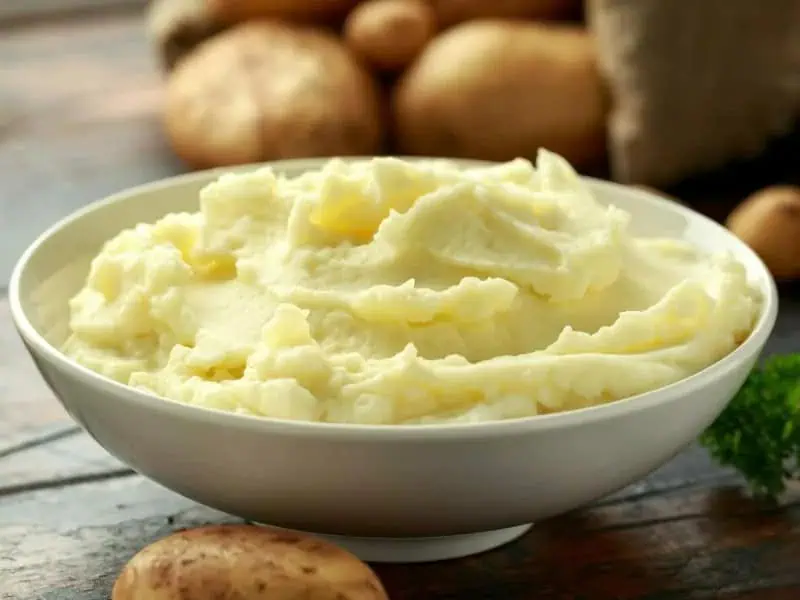 image 247 135 - Delicious Mashed Potatoes seeks to make the most delicious mashed potatoes you’ve ever tasted, and it succeeds! The potatoes are fluffy, creamy, buttery, rich, and infused with garlic flavors. Add in a little tangy cream cheese and Delicious Mashed Potatoes become something extraordinary. This is the perfect side dish for holiday feasts or just a simple chicken dinner at home!