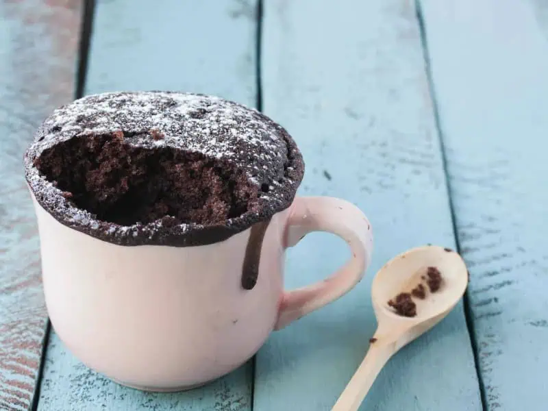 image 247 141 - You don’t need to be a skilled baker to whip up these 5-Minute Molten Chocolate Mug Cakes! Just combine all the ingredients in a mug (without fully combining the coffee!), hit 2 minutes on the microwave, and you’ll have delicious molten chocolate cakes. Dig into these 5-Minute Molten Chocolate Mug Cakes for rich, melted chocolate in every bite, and top with ice cream for some added sweetness!