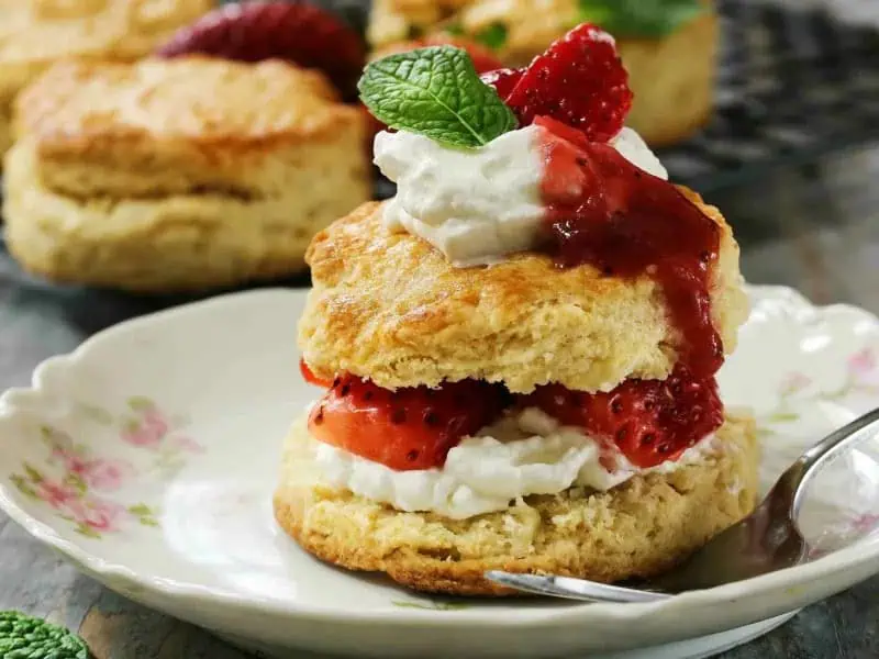 image 247 234 - Old-Fashioned Strawberry Shortcake is a simple, classic, delicious dessert! The tartness of the strawberries and lemon cut into the buttery shortcake for a perfectly balanced confection that will leave you wanting more. Old-Fashioned Strawberry Shortcake is a classic for a reason! Top it with vanilla ice cream or fresh cream for a treat that is out of this world.