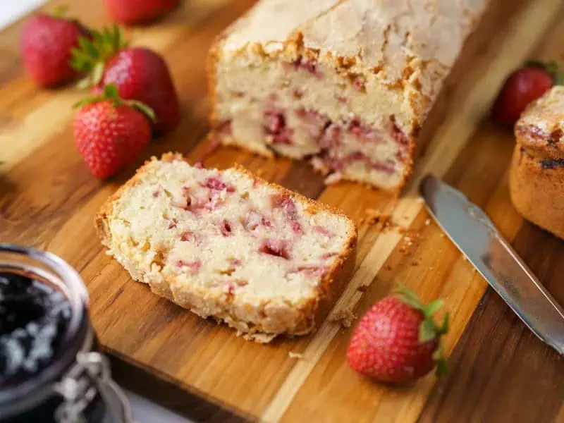 image 247 25 - When you can't really determine whether it's a dessert or breakfast food, that's when you know you've got a breakfast bingo! Strawberry Shortcake Loaf walks that beautiful blurry line of deliciousness. The tender, golden-brown loaf gives off strong morning meal vibes, but the sweet, juicy strawberries mixed within and the crunchy sprinkles of sugar on top push the treat towards the title of after-dinner delight. Served whenever your tastebuds desire, Strawberry Shortcake Loaf is wonderful any time of the day!