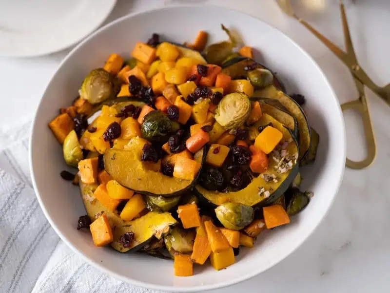 image 89 - Here's a cooking secret: people actually do like vegetables, it's just that most vegetable sides are bland and boring. Fall Harvest Veggies averts this common problem by making vegetables exciting, delicious, and nourishing all at once! Leafy, hearty Brussels sprouts, bright, juicy carrots, creamy sweet potatoes, and autumnal butternut squash mix together for that full harvest taste, enhanced by aromatic garlic, rosemary, and sage. Roasted to a tender golden brown, Fall Harvest Veggies are the perfect side dish for turkey dinners or fall-themed pork chops. This is proof positive that vegetables aren't something to be dreaded but celebrated!