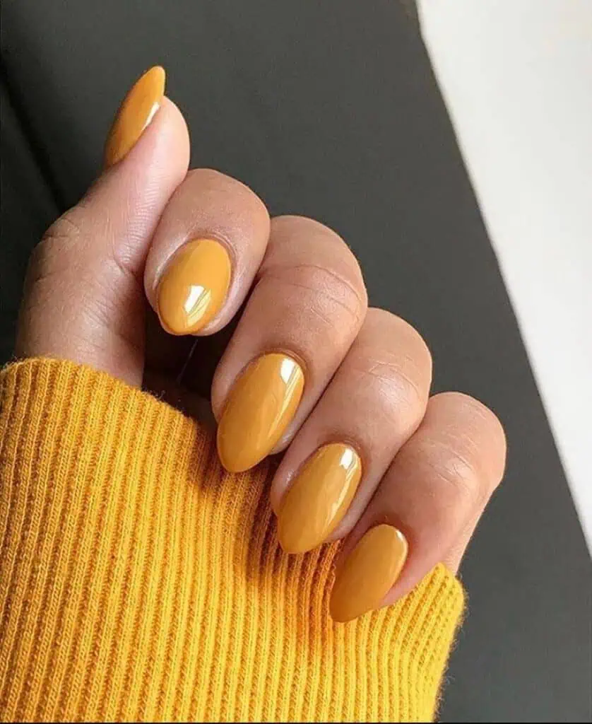 Discover the charm of mustard yellow nails with top nail polishes and unique nail art designs. Ideal for every season.