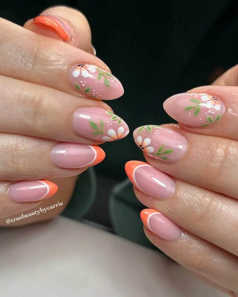 Spring French tip nails featuring a blend of pink and blue, capturing the essence of vibrant spring designs and seasonal colors.
