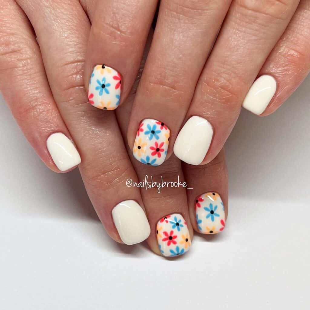 Bright and stylish spring nails with 3D flowers, pastel fades, and fun abstract designs for a refreshing seasonal look.