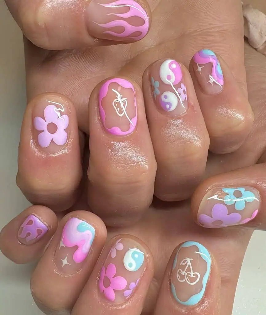 Bright and charming spring nail designs with adorable floral art, ideal for highlighting your distinctive spring nail concepts.