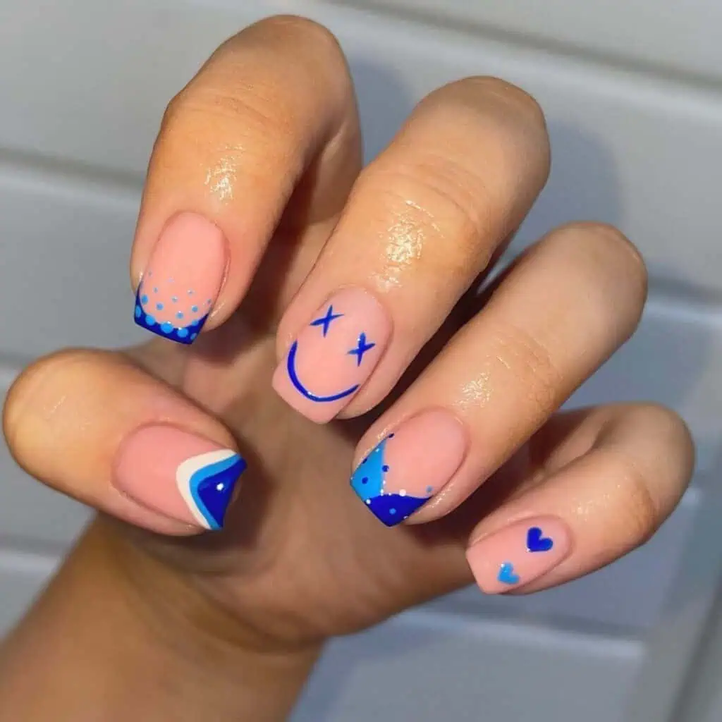 Cheerful and lively summer nail designs with bold hues of azure, rose, and lemon, showcasing seaside themes and flower motifs.