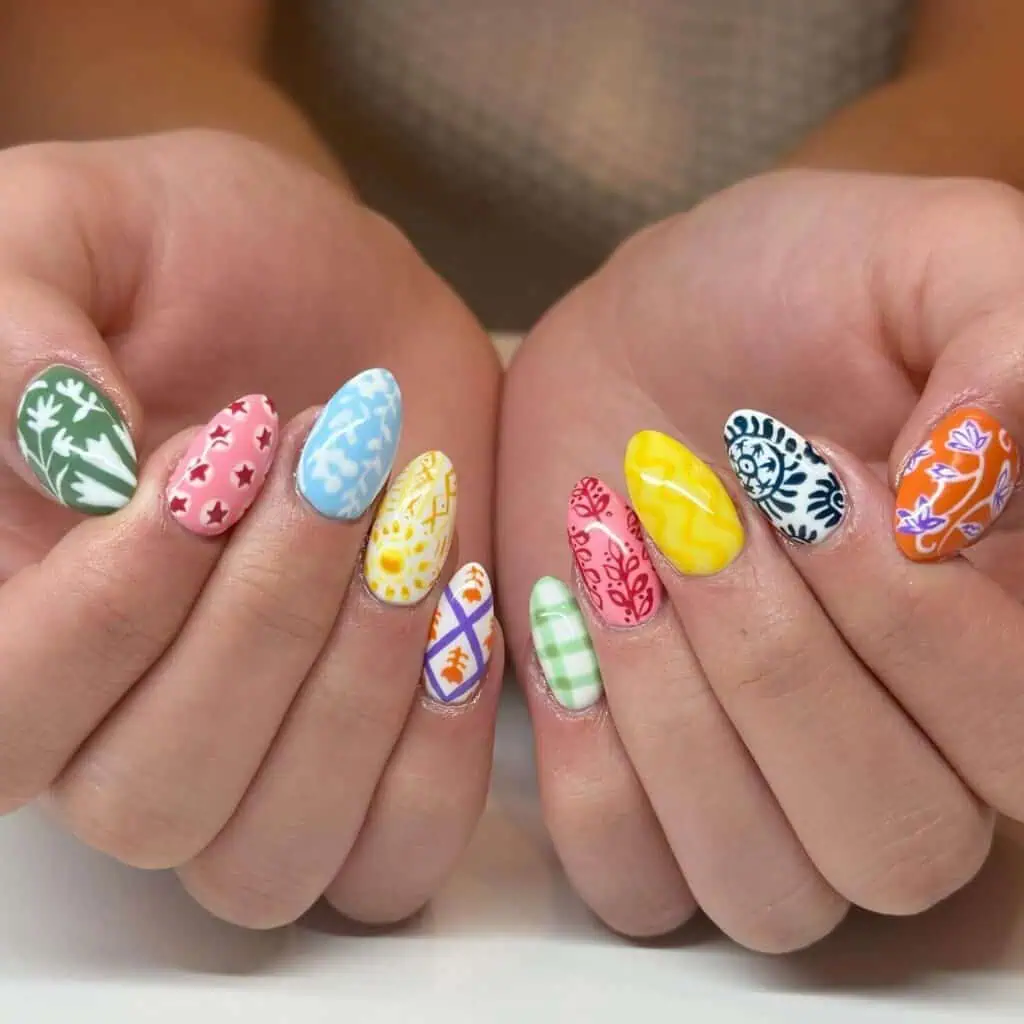 A collection of vibrant and artistic summer nail art on impeccably groomed nails.