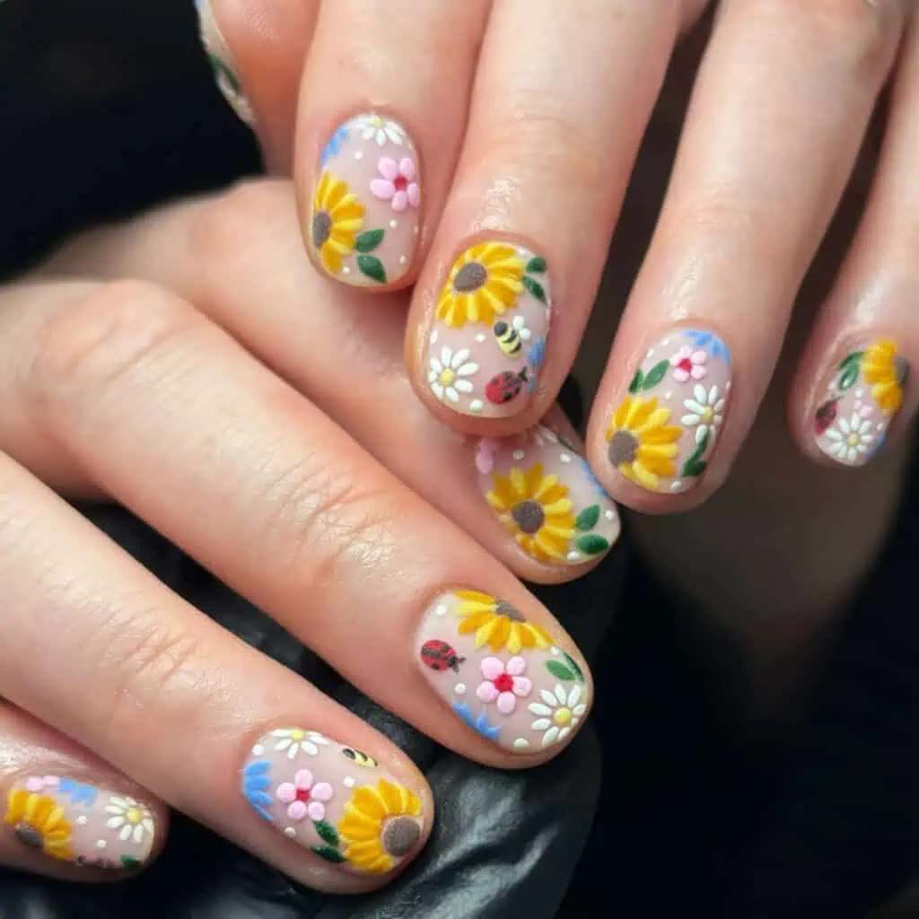Sophisticated sunflower nail art with detailed patterns on gel and matte finishes, suitable for all seasons.