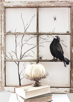 farmhouse Halloween Vignette with crow, old window frame and white pumpkin