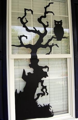 Halloween window decor using black vinyl and clipart