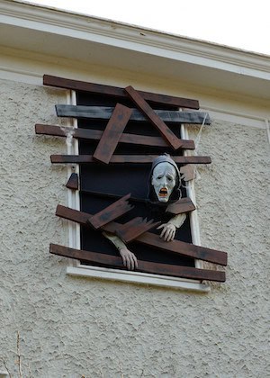 zombie breaking out of window decor