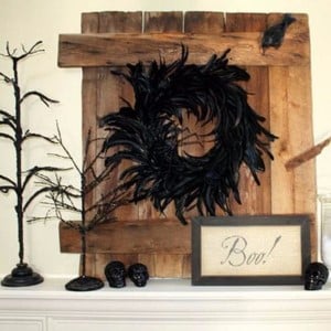 Rustic Halloween Mantel with black feather halloween wreath