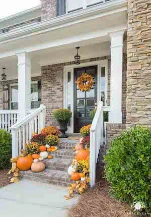 pumpkin lined front steps