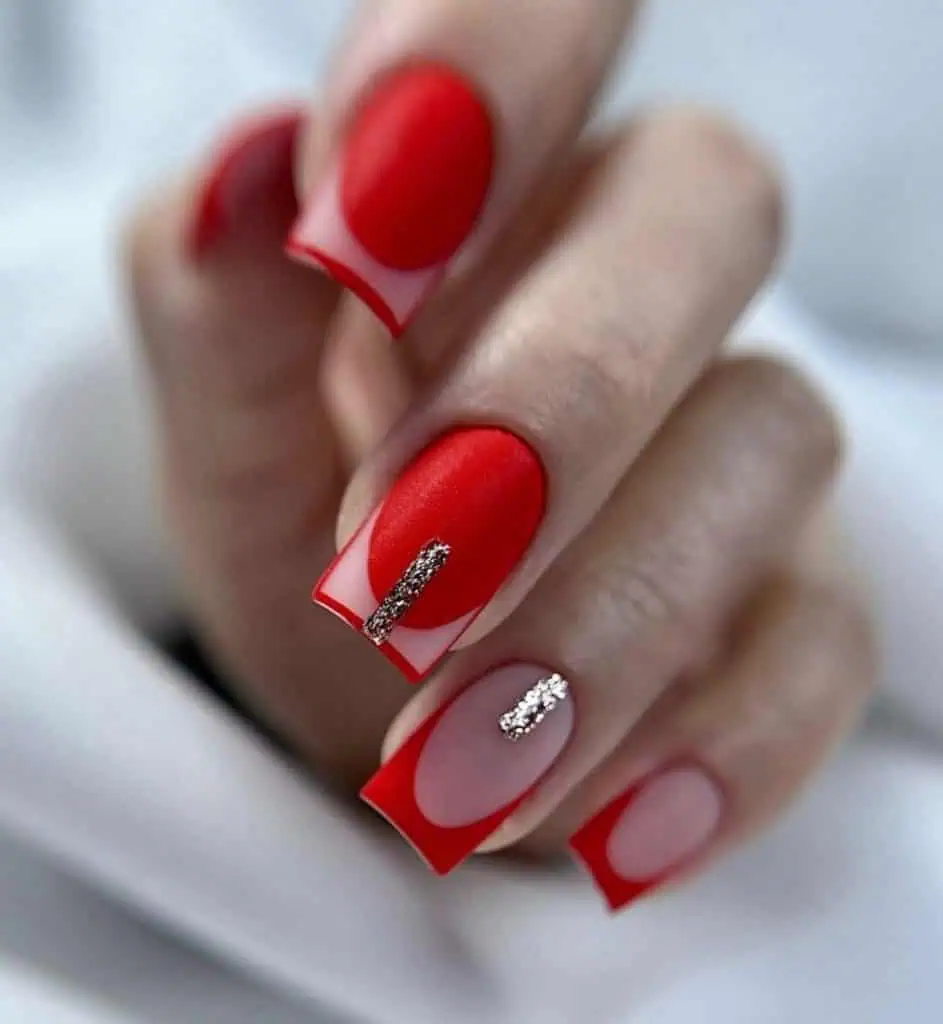 6 13 - Vivid red nails have long been a staple in the world of fashion and beauty, capturing attention with their bold and striking appeal. Whether you're preparing for a special occasion or simply want to make a statement, these red nail ideas will inspire your next salon visit or DIY manicure.